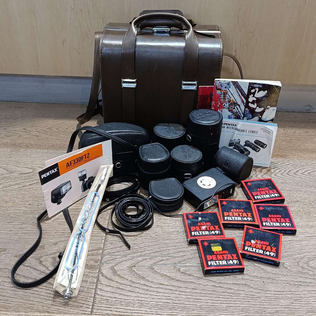 Vintage Pentax Spotmatic 35mm film camera with extra lenses and accessories in camera case