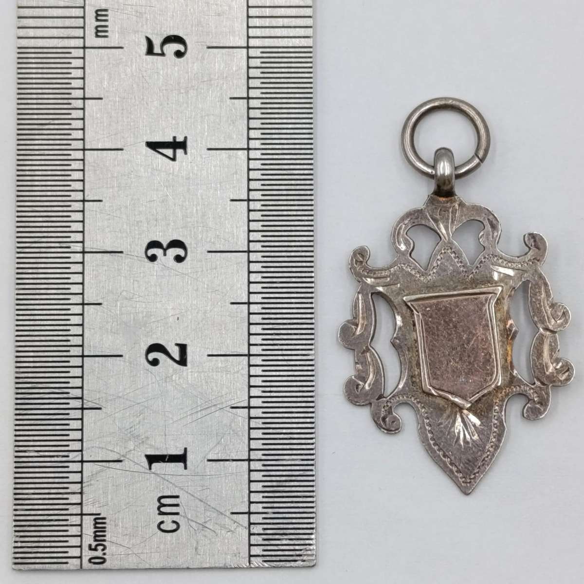 Antique Sterling silver and gold fob medallion - weighs 3,3g