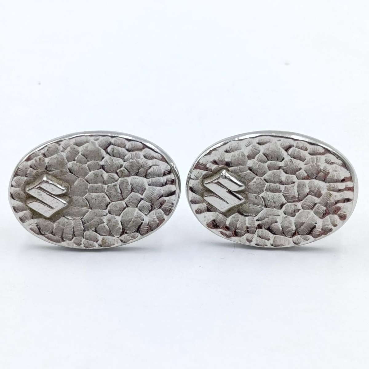 Pair of Suzuki cufflinks