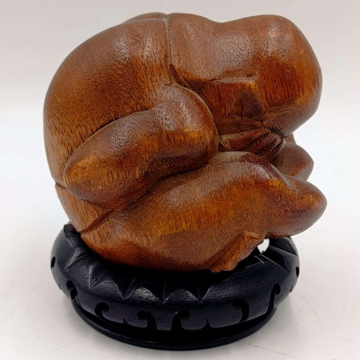 Handcarved wooden weeping buddha sculpture
