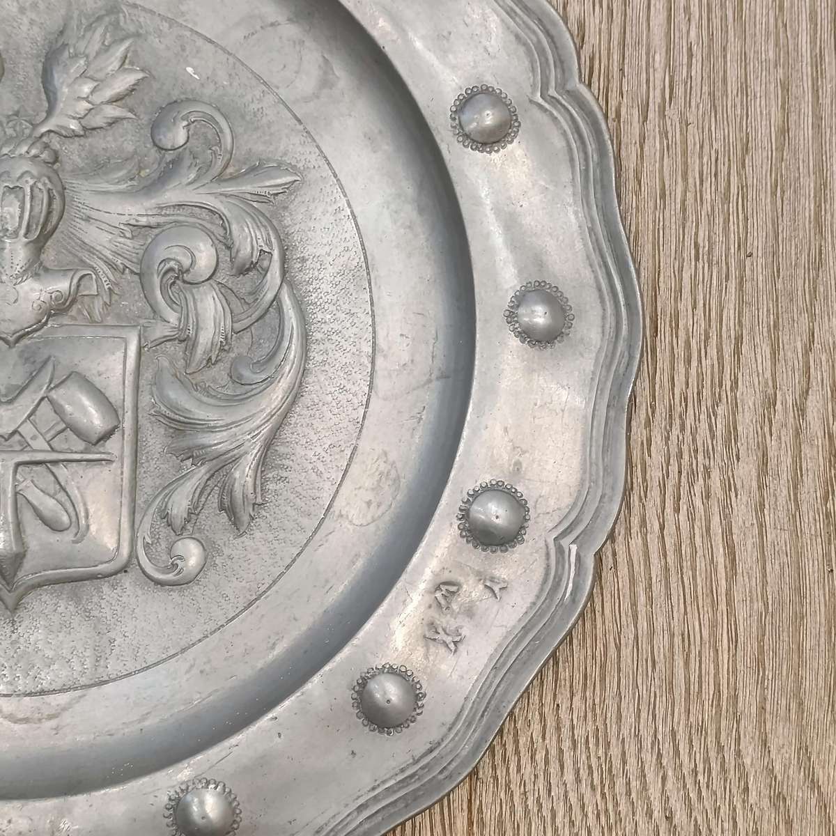 Antique English pewter plate with coat of arms