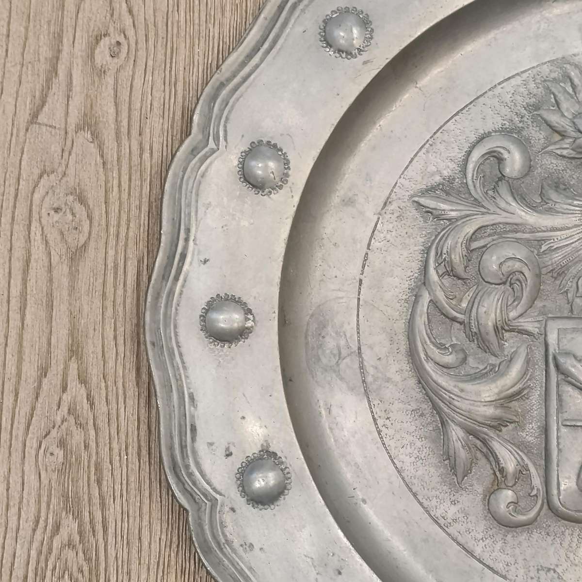 Antique English pewter plate with coat of arms