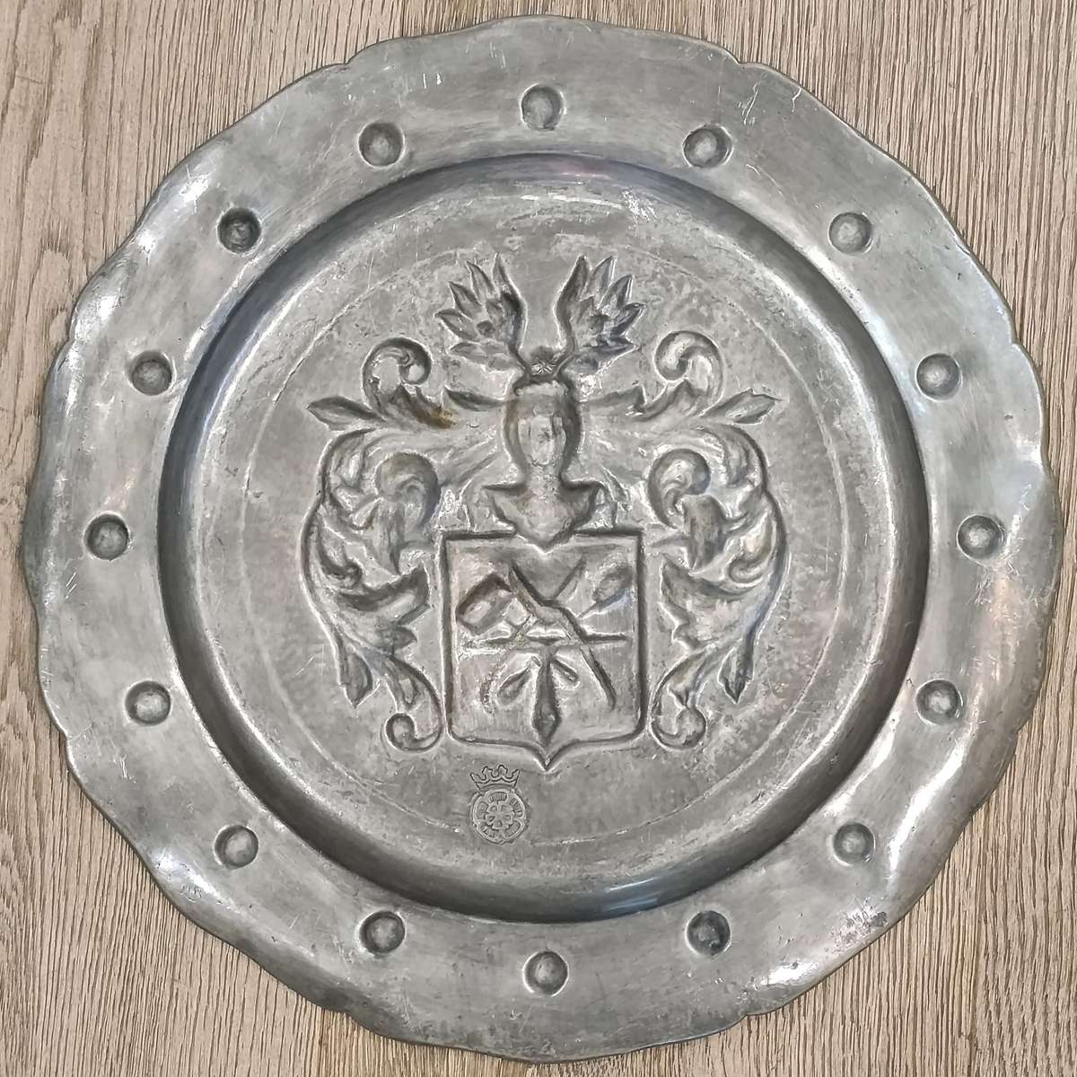 Antique English pewter plate with coat of arms