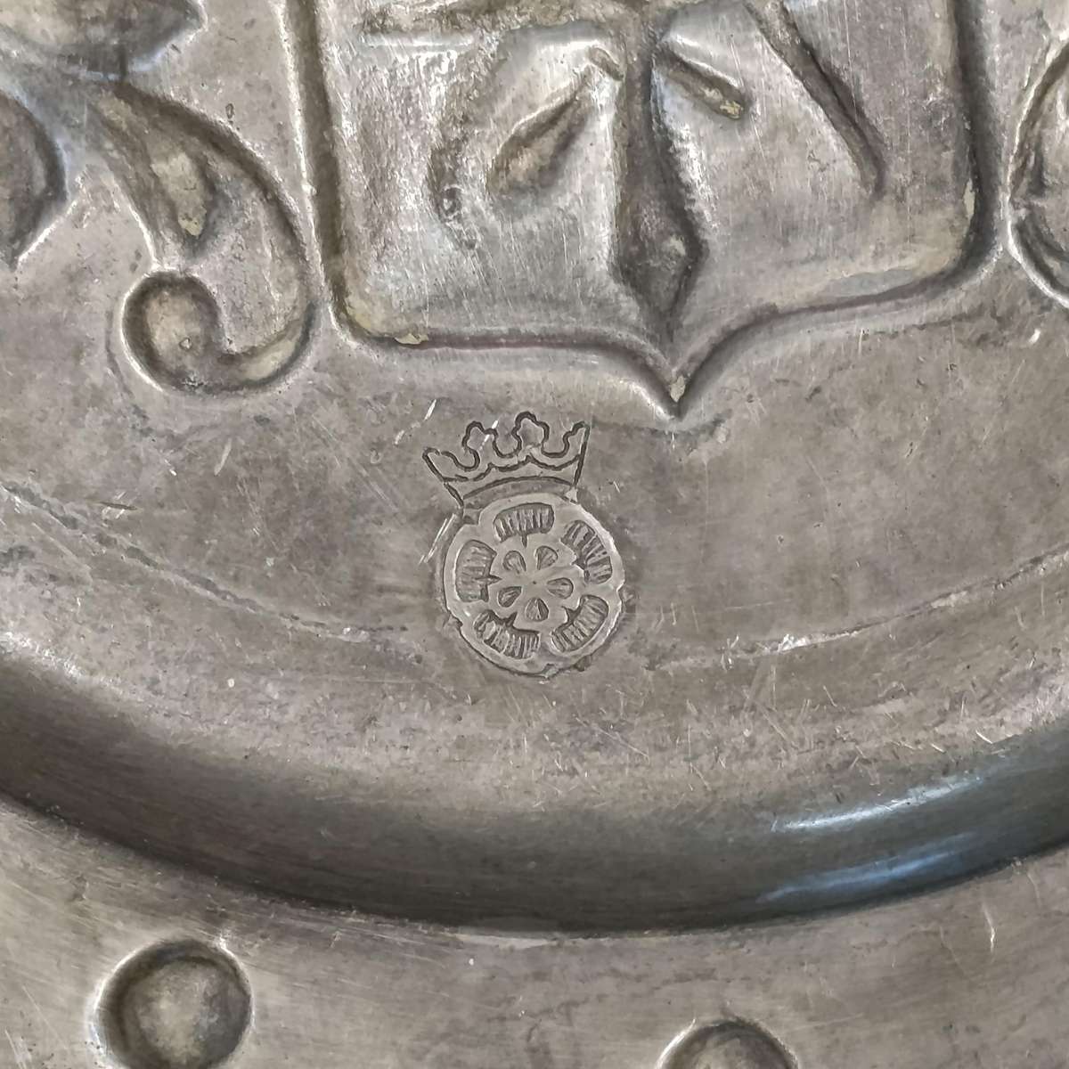 Antique English pewter plate with coat of arms