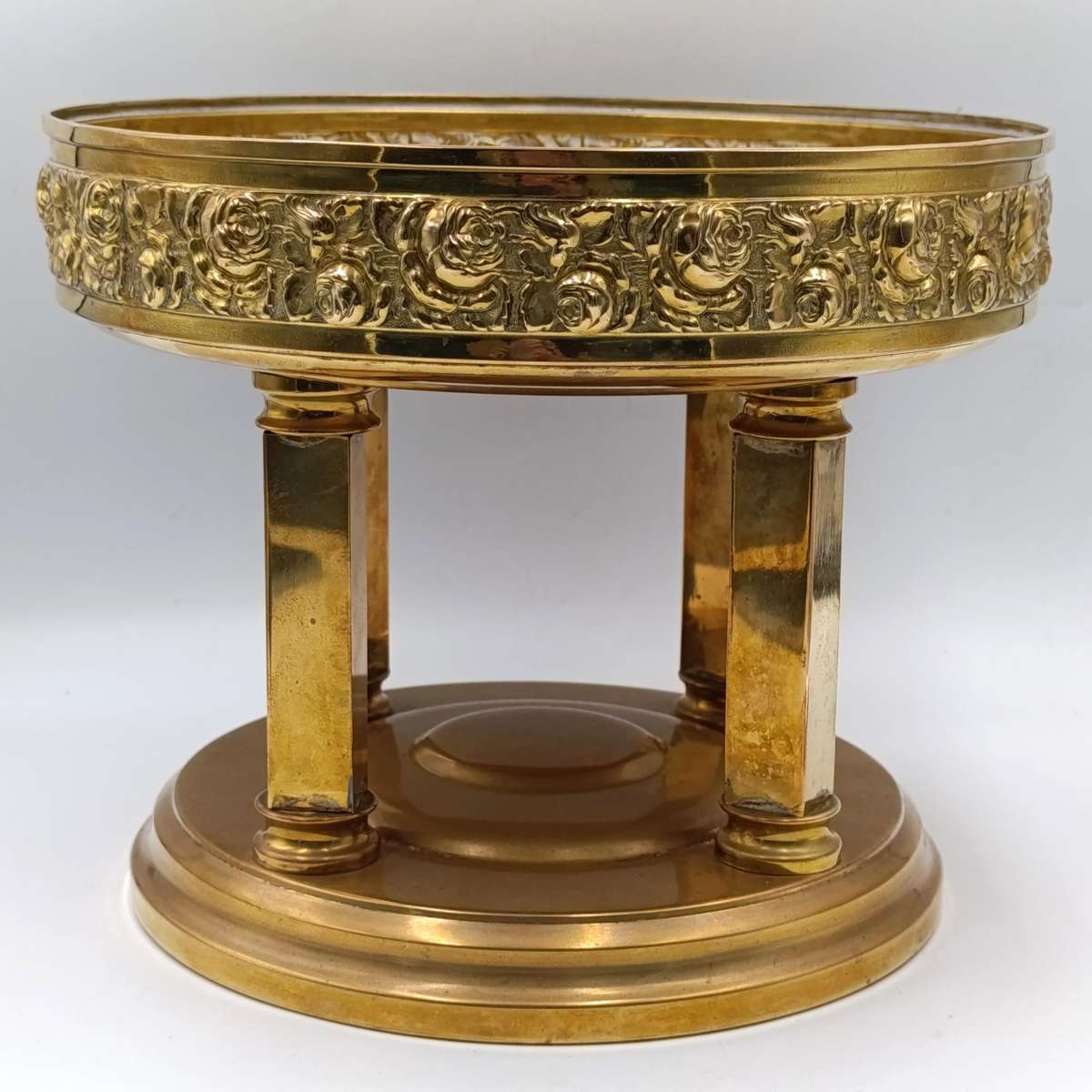 Vintage brass fruit bowl with rose design and 4 pillars