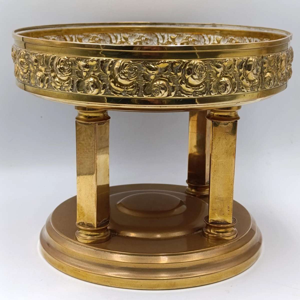 Vintage brass fruit bowl with rose design and 4 pillars