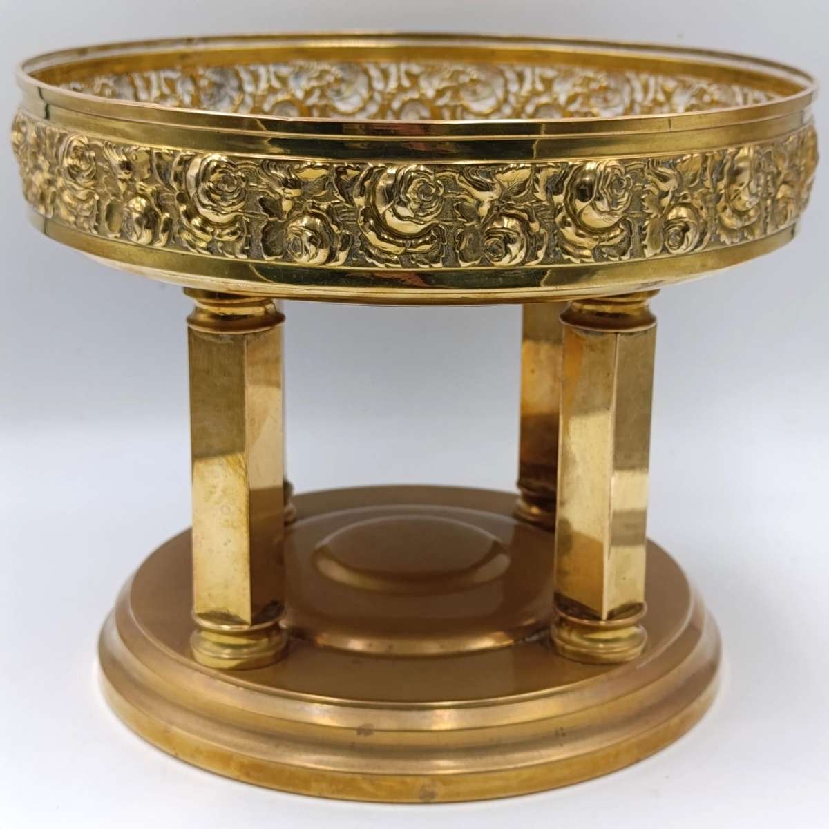 Vintage brass fruit bowl with rose design and 4 pillars
