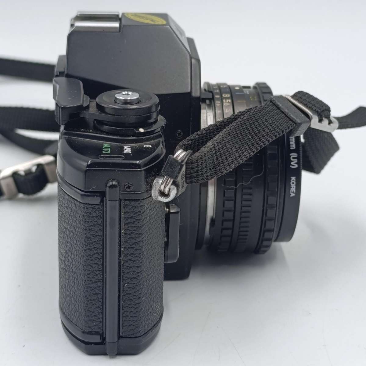 Vintage Nikon M90 35mm film camera with Nikon Series E 1:1.8 50mm lens - shutter firing