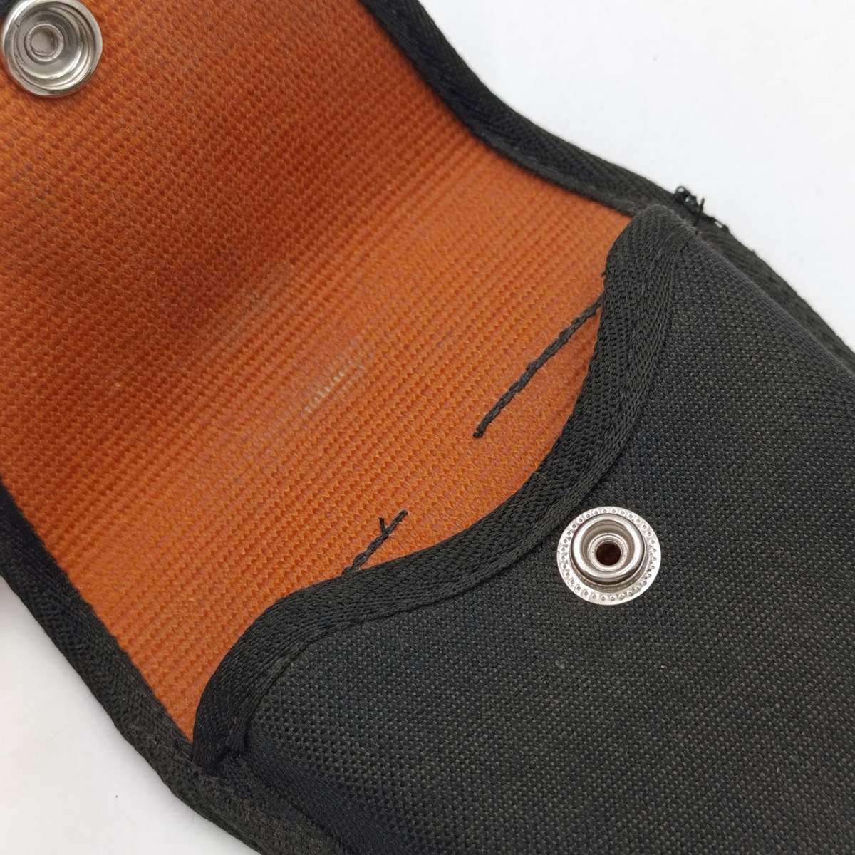 Pair of handcuffs in pouch