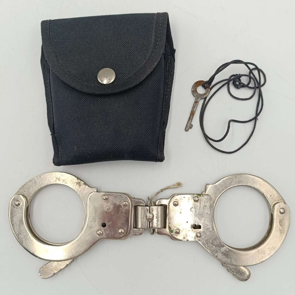 Pair of handcuffs in pouch
