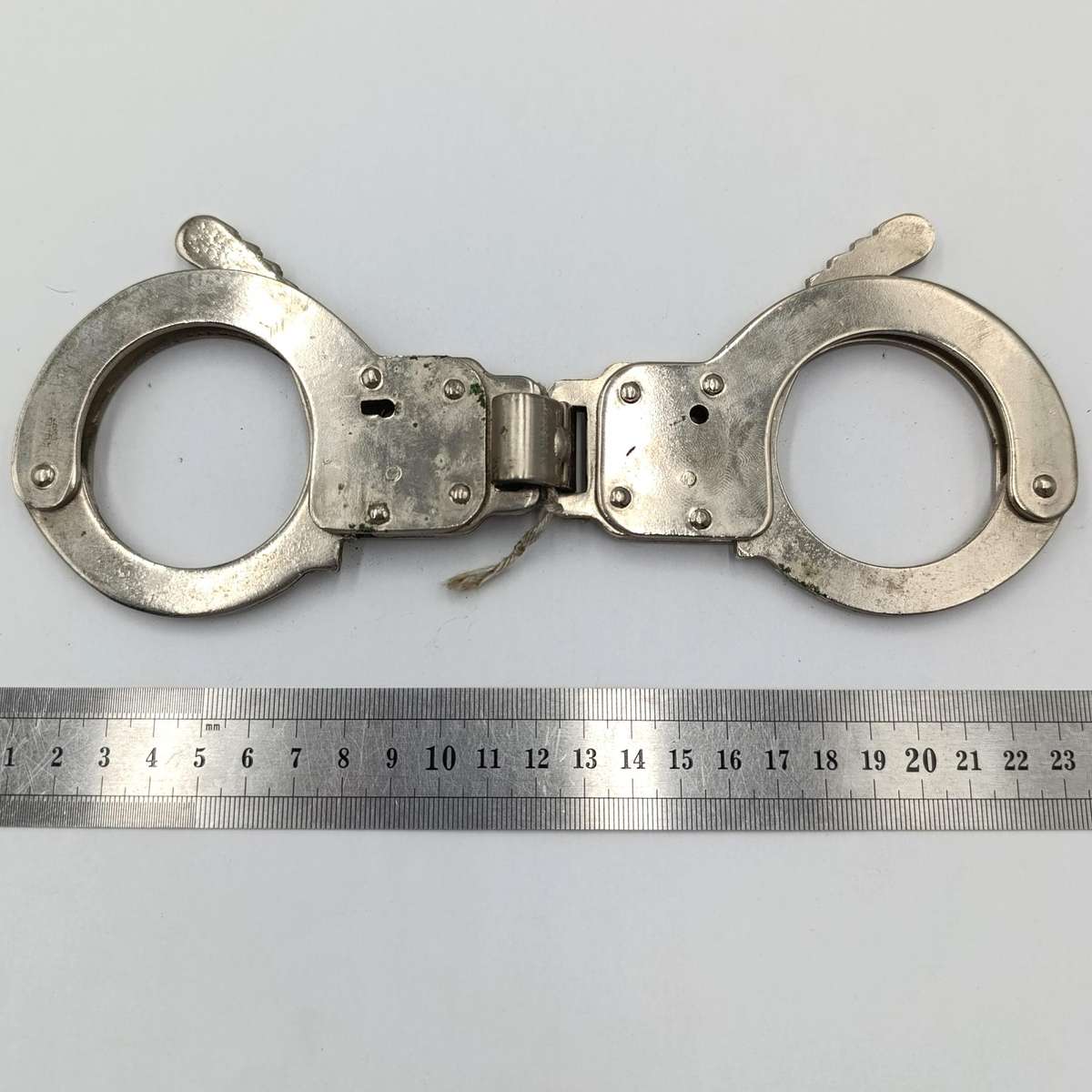 Pair of handcuffs in pouch