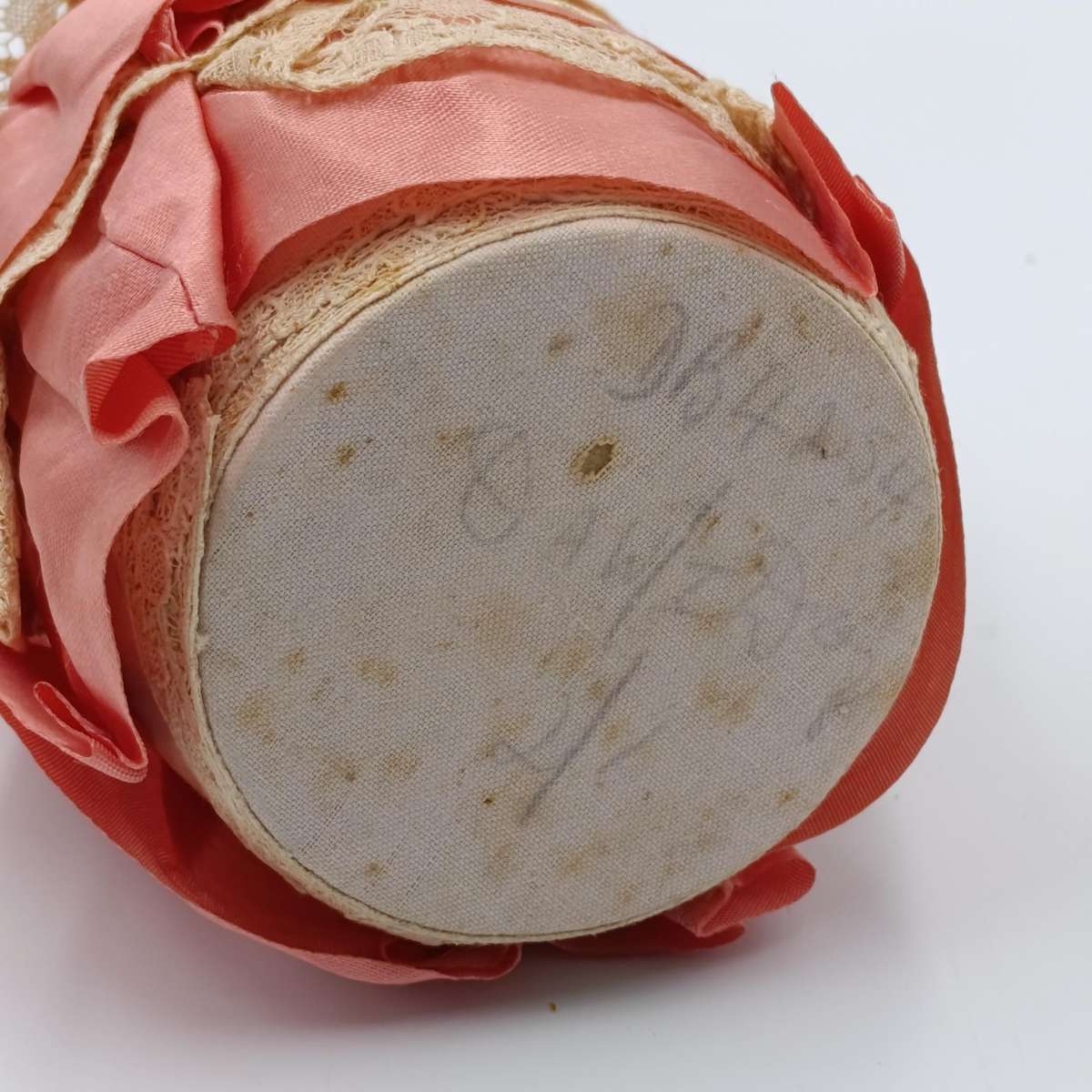 Antique porcelain doll needle cushion