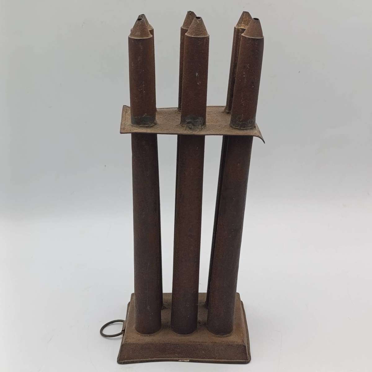 Antique tin 6-tube candle mold