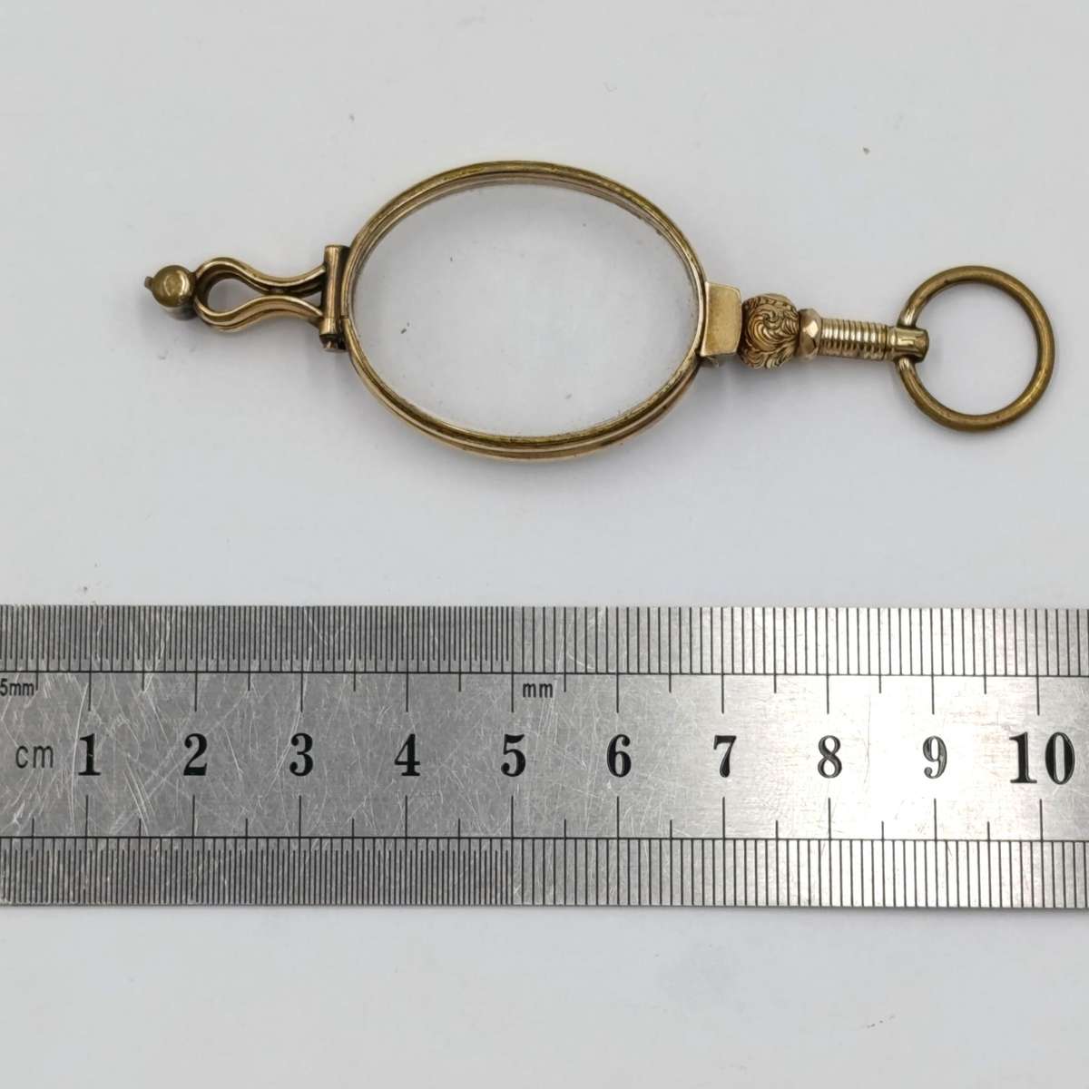 Antique goldplated lorgnette folding glasses in pouch