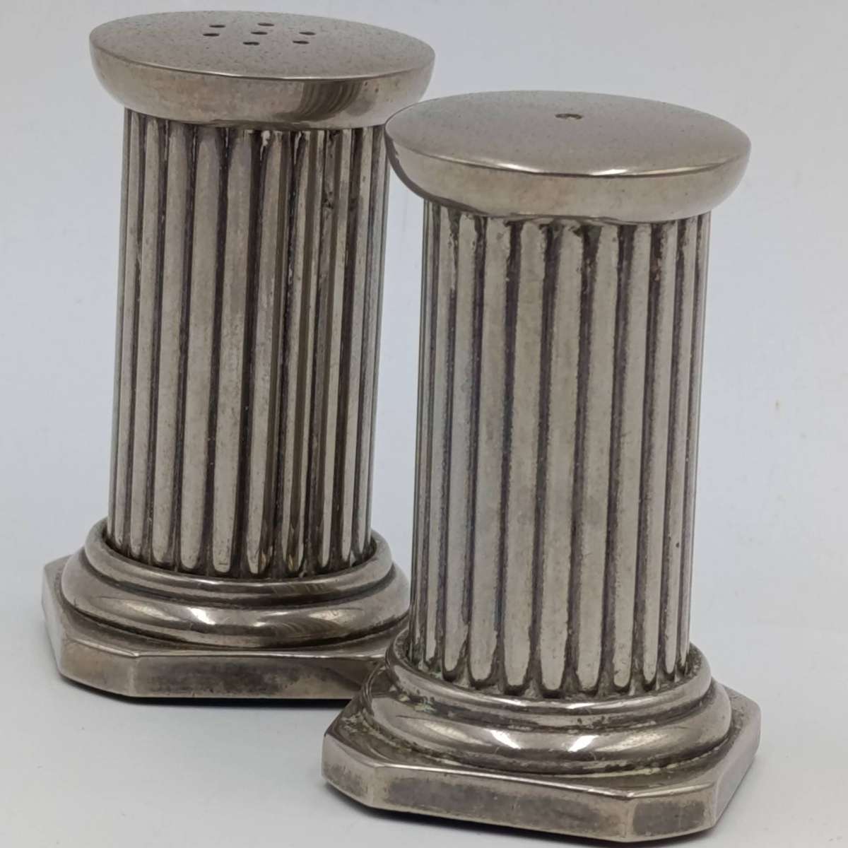 Pair of silverplated column pillar shaped salt and pepper shakers