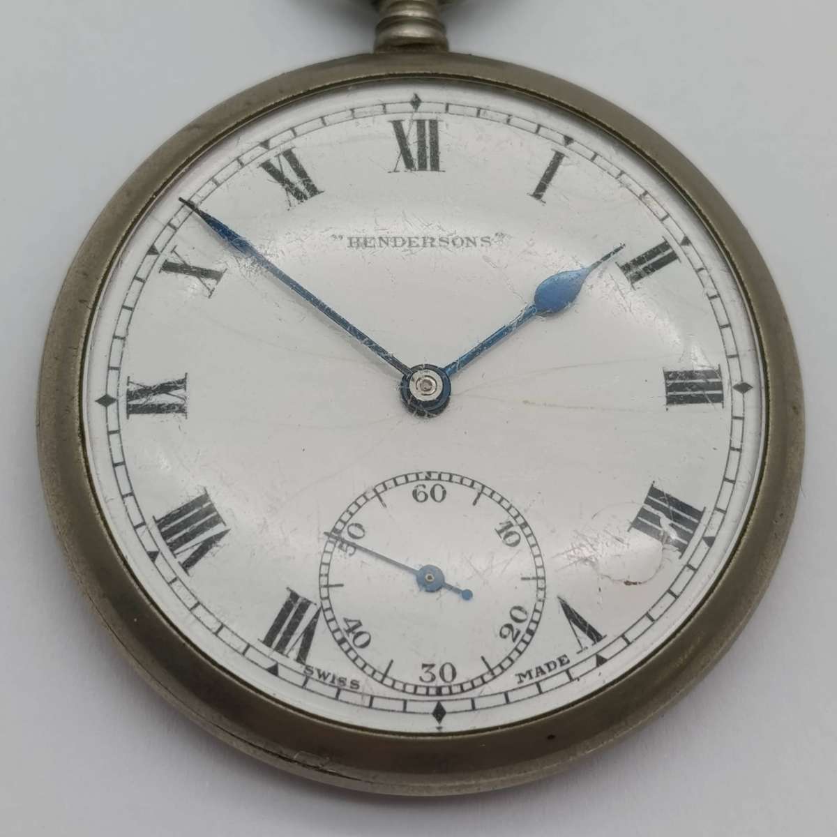 Antique Hendersons pocketwatch - working - working - chip on dial repaired