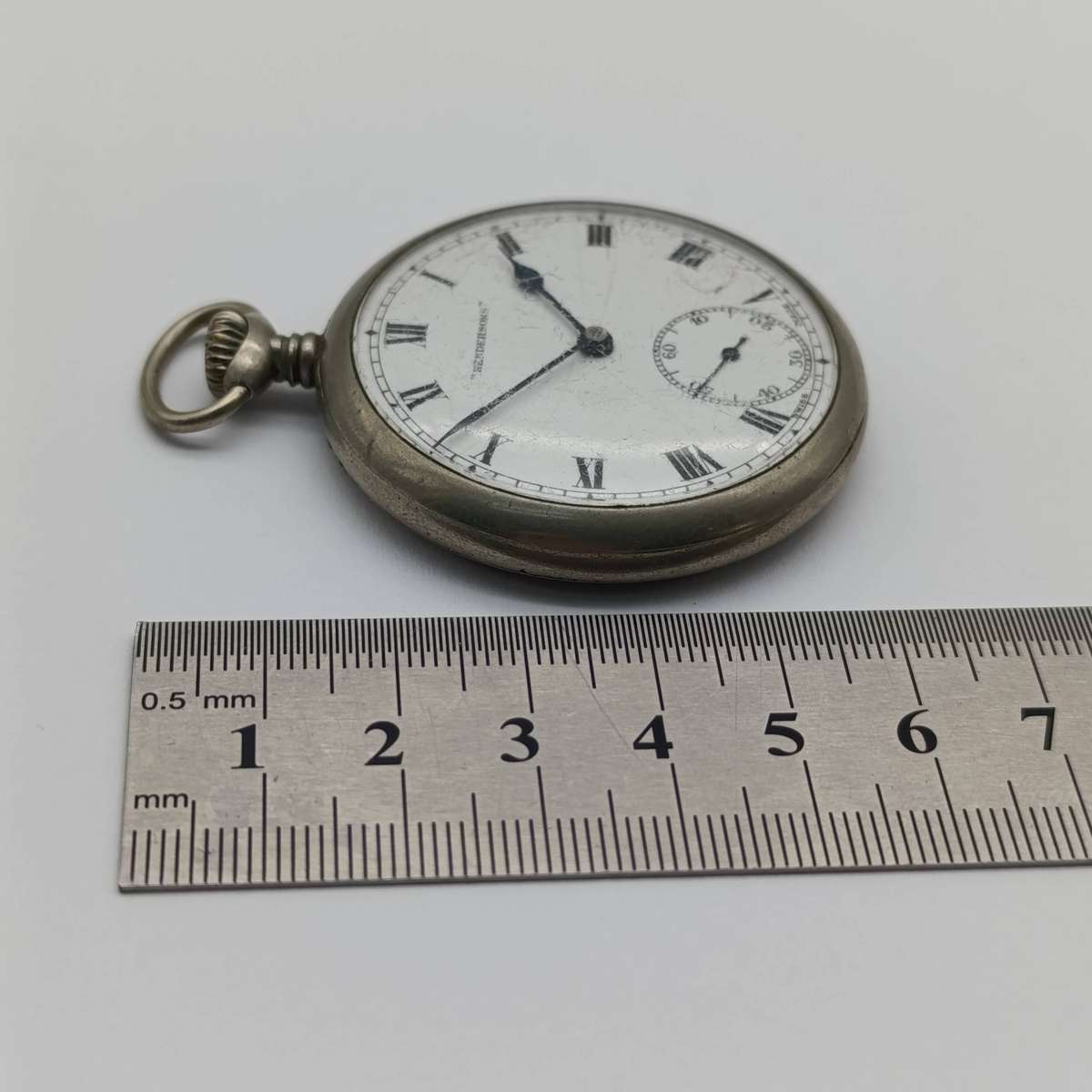 Antique Hendersons pocketwatch - working - working - chip on dial repaired
