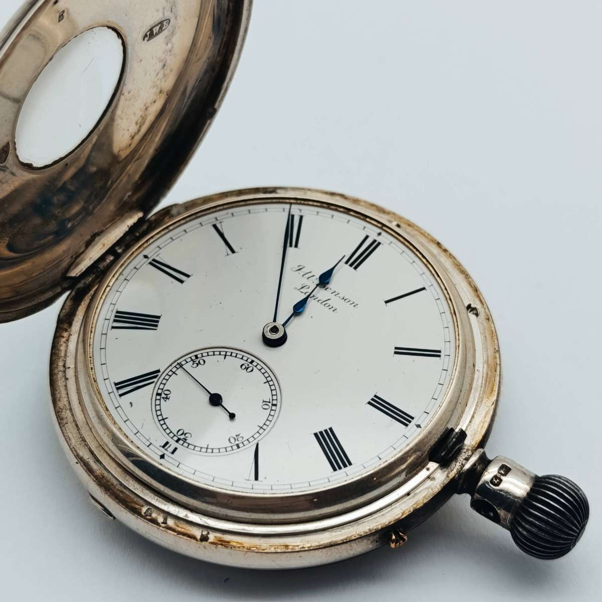 Antique hallmarked silver 1892 half hunter pocketwatch in silver front travelling case - working