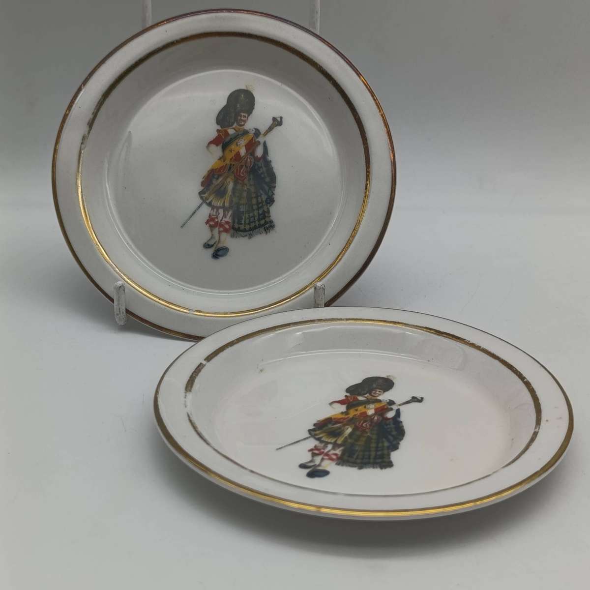 Pair of Vintage Dewar's white label whisky porcelain coasters