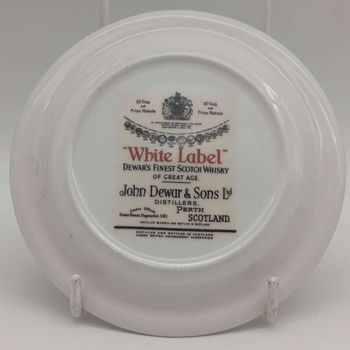 Pair of Vintage Dewar's white label whisky porcelain coasters