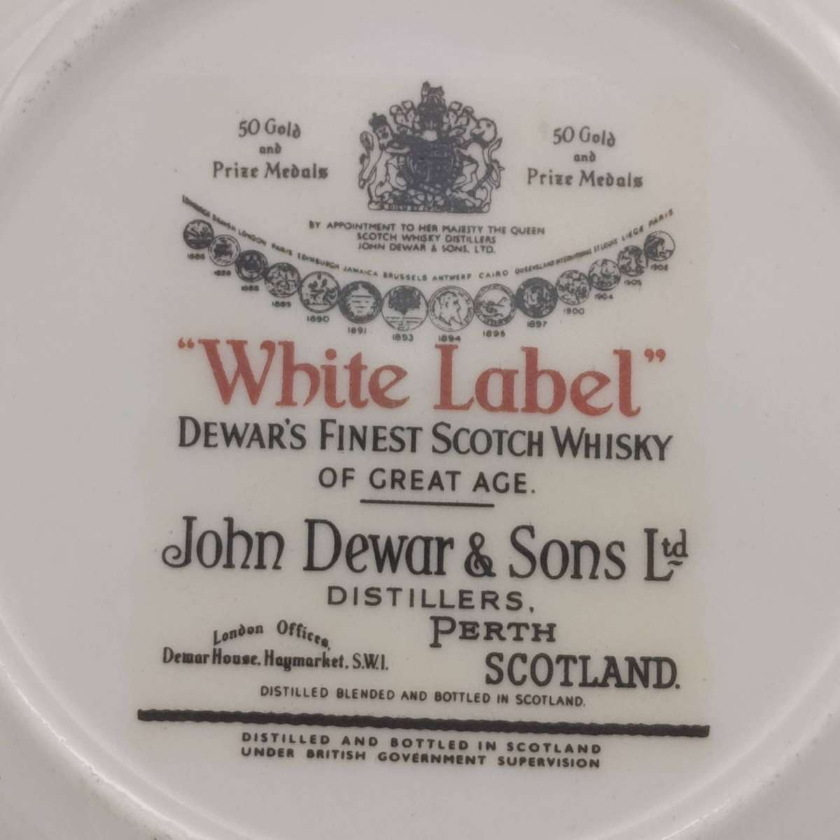 Pair of Vintage Dewar's white label whisky porcelain coasters