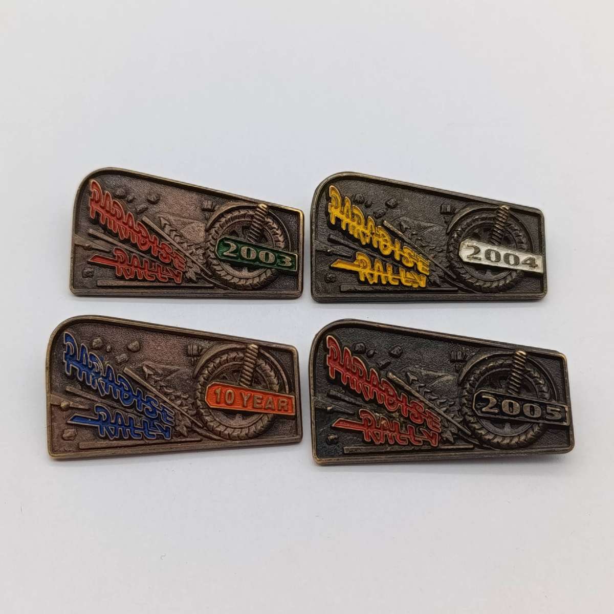 Lot of 4 Paradise Rally motorcycle badges