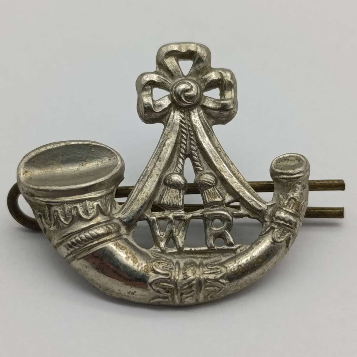 Set of Witwatersrand rifles badges - cap, collars and shoulder titles