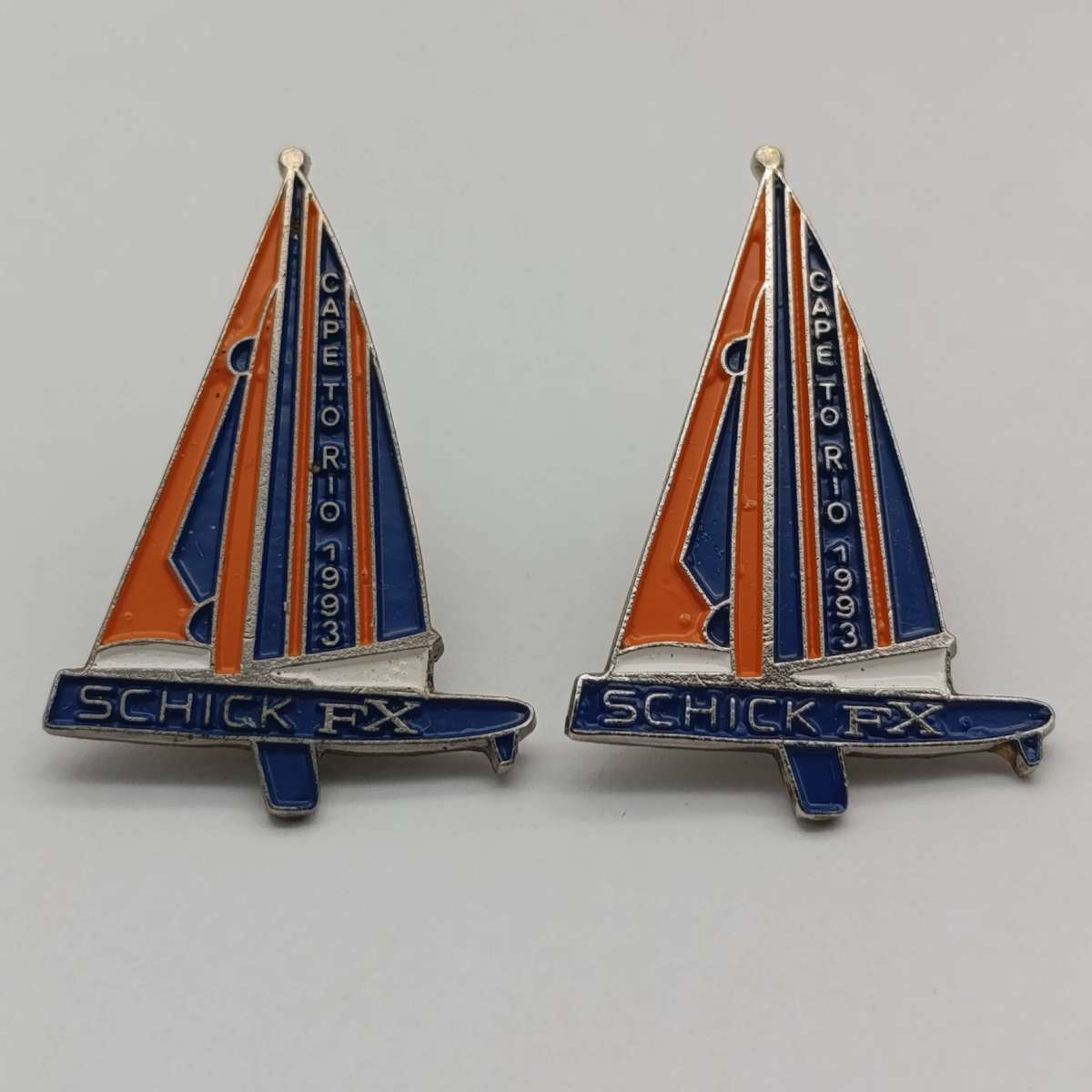 Pair of 1993 Cape to R10 Lapel badges