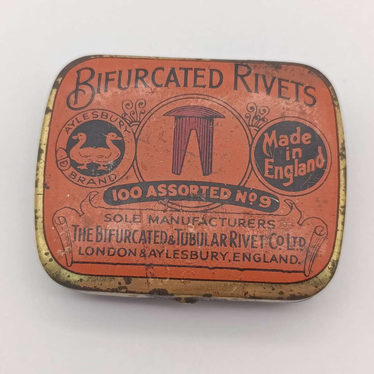 Antique bifurcated Rivets in tin