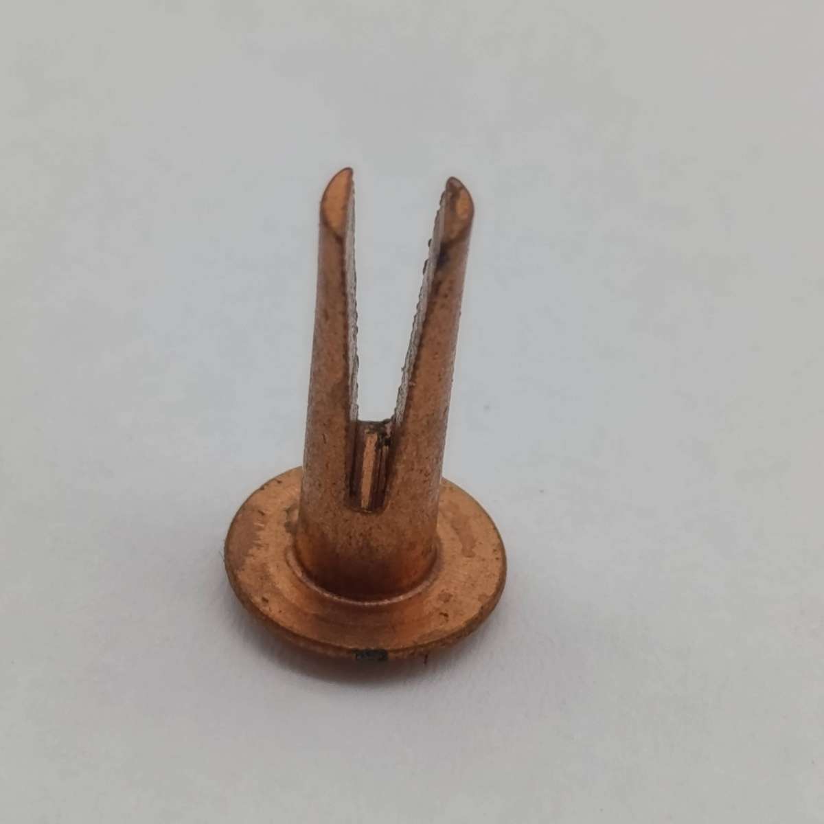 Antique bifurcated Rivets in tin