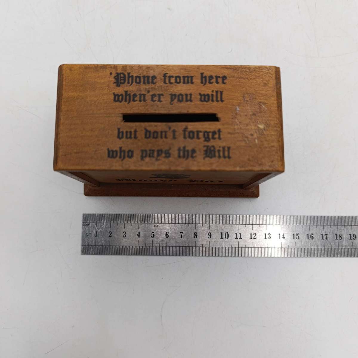 Vintage wooden telephone money box