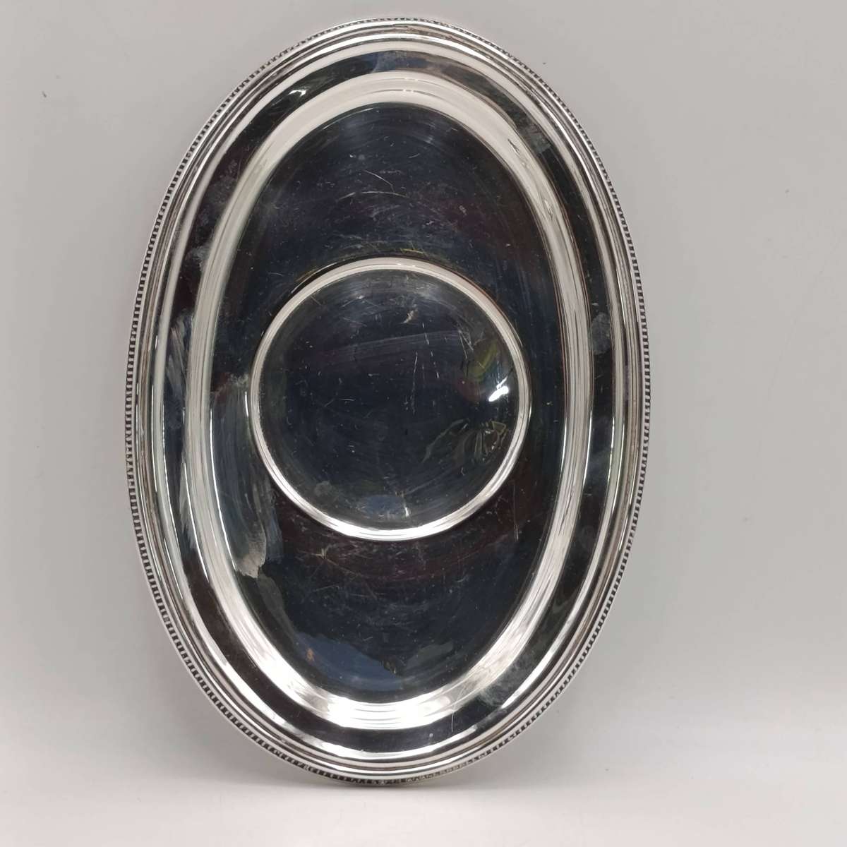 Vintage silverplated gravy boat with saucer