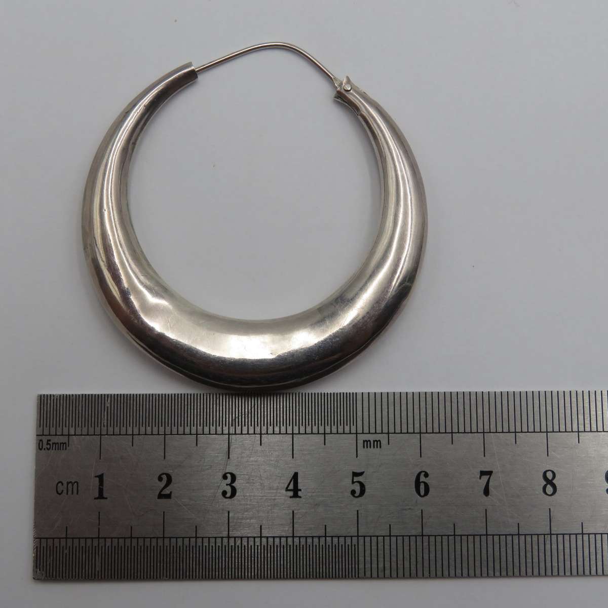 Pair of Large sterling silver hoop earrings - weighs 11,8 grams
