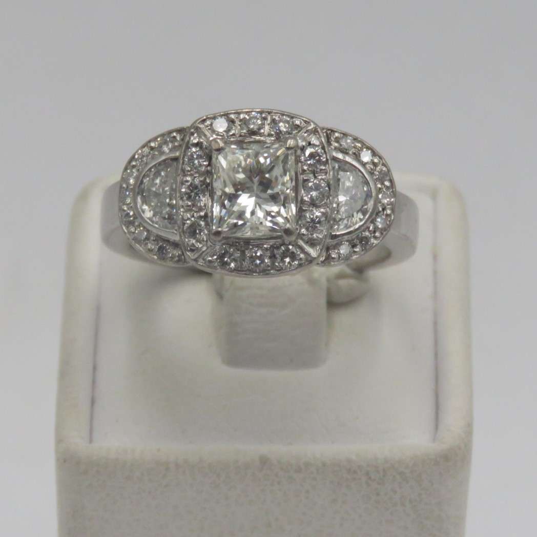 Bespoke 9kt white gold diamond ring with 1,09ct Princess cut diamond with 2 x colour D/E half moon