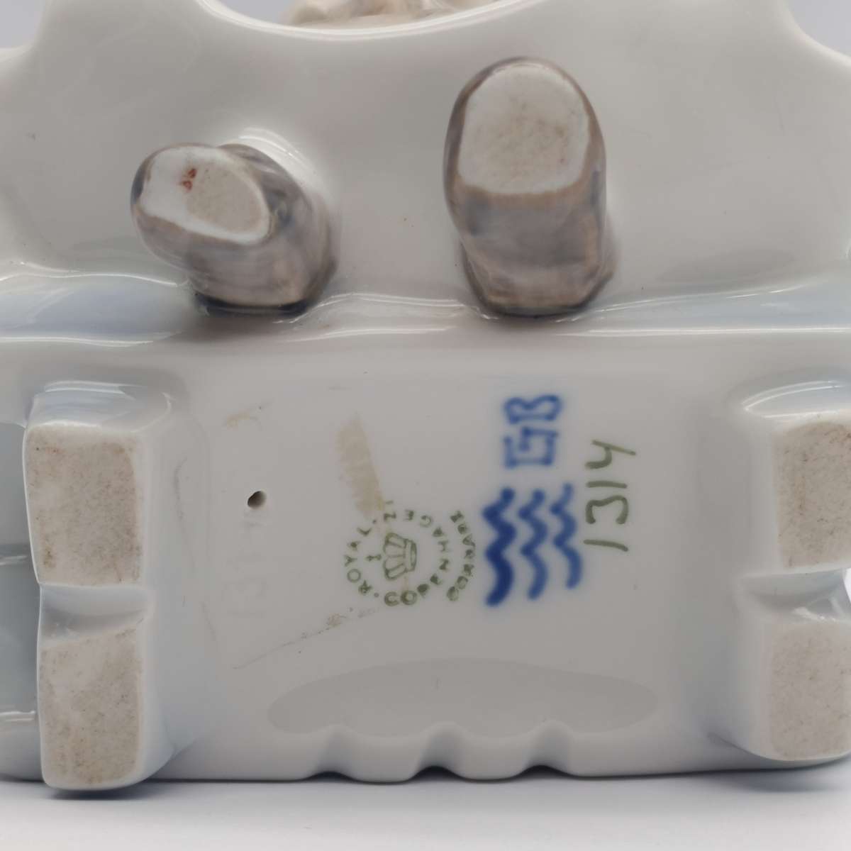 Vintage Royal Copenhagen girl sewing porcelain figurine