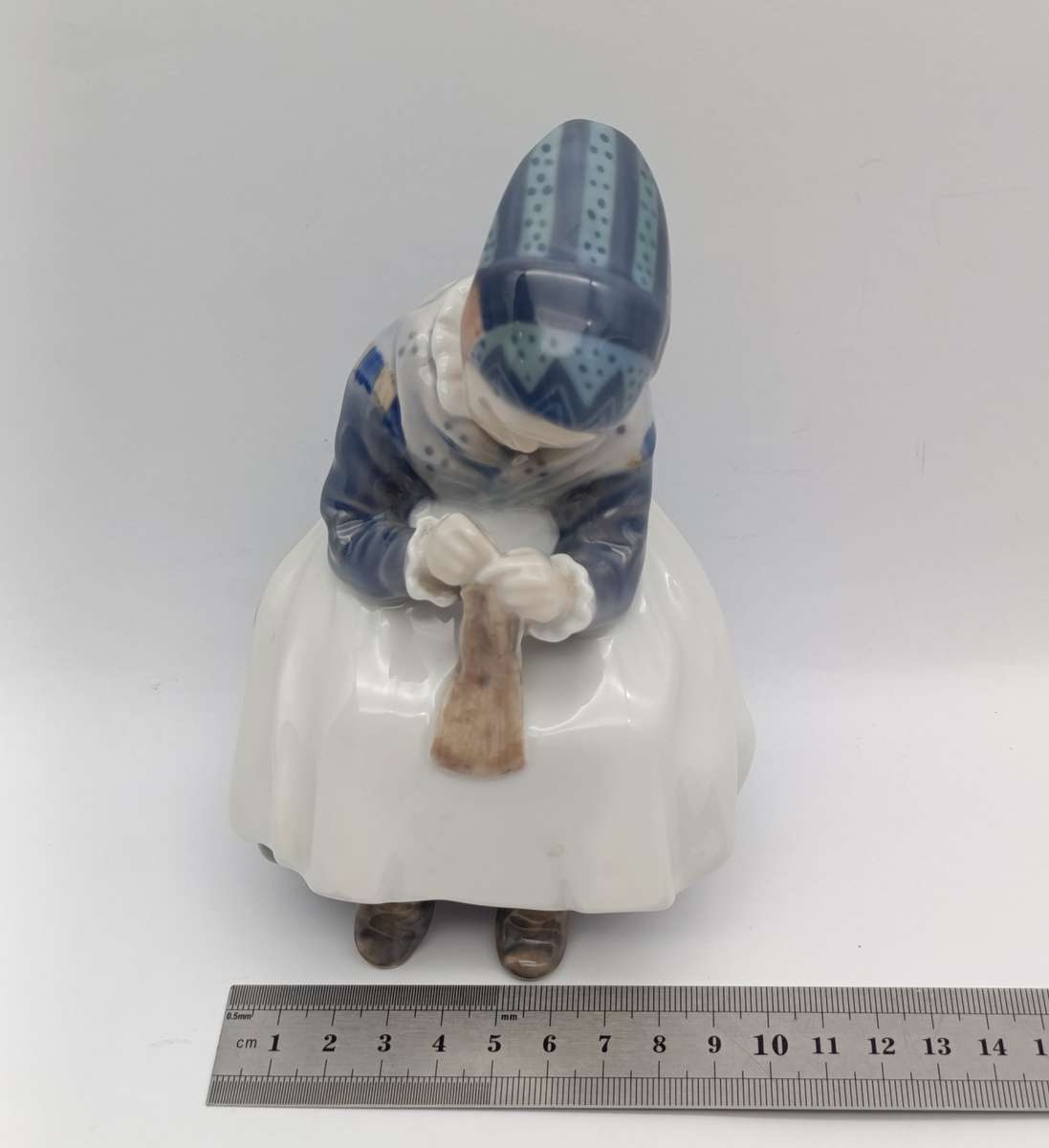 Vintage Royal Copenhagen girl sewing porcelain figurine