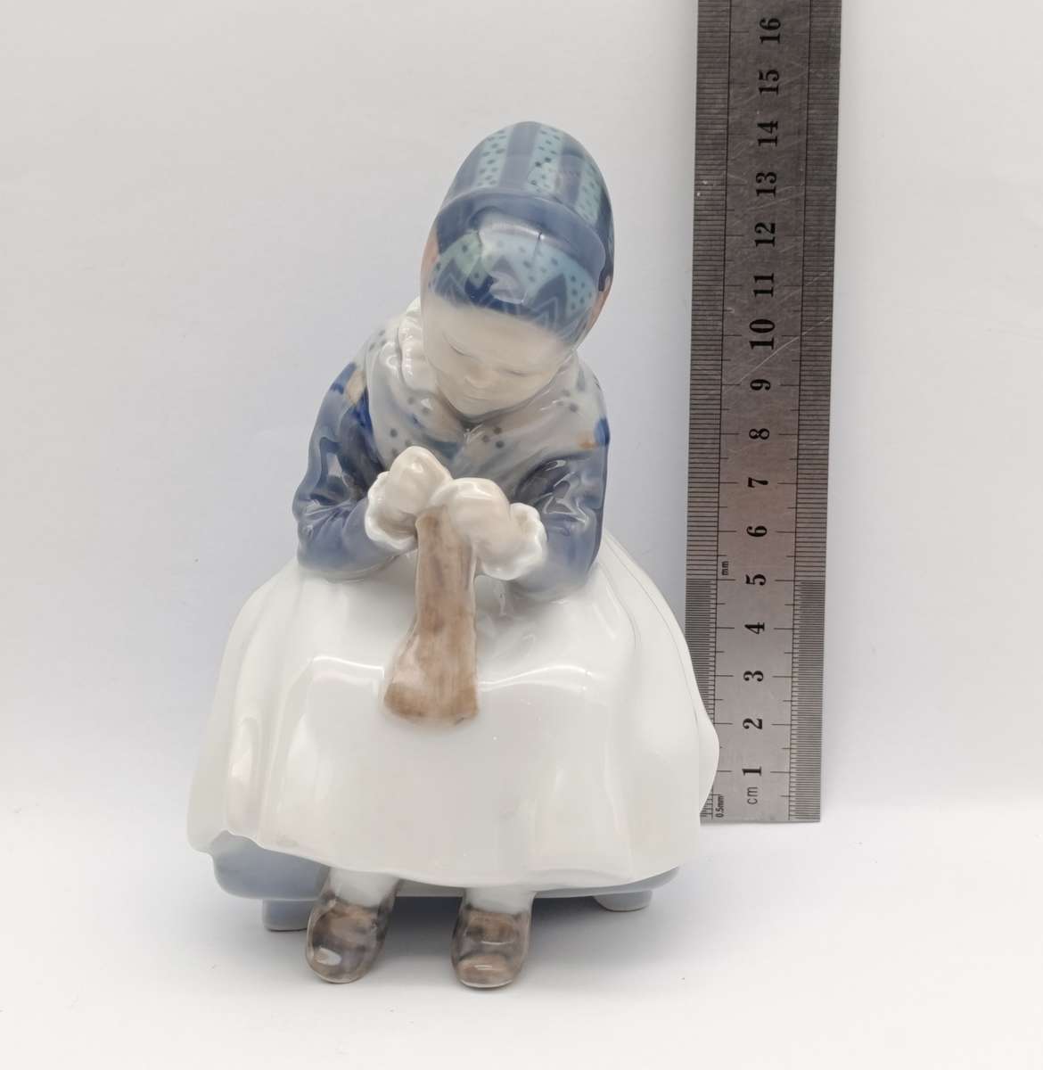 Vintage Royal Copenhagen girl sewing porcelain figurine