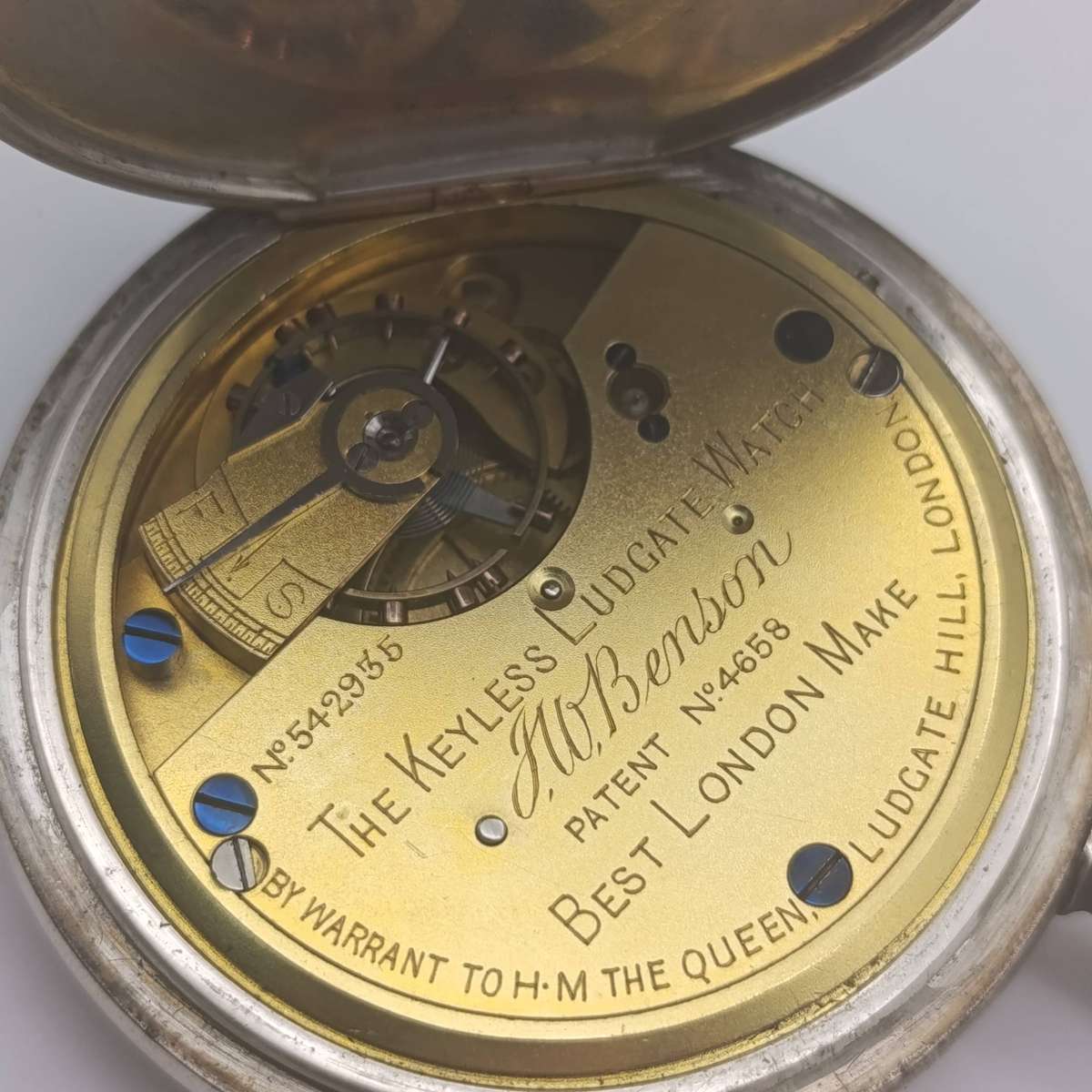 Antique hallmarked silver 1892 half hunter pocketwatch in silver front travelling case - working