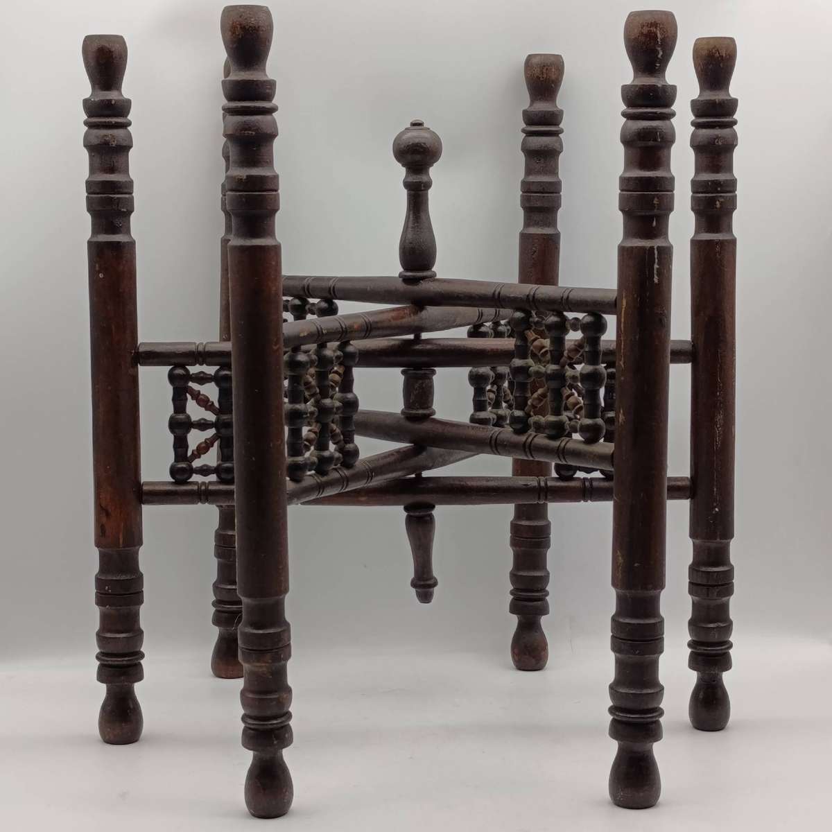 Antique folding table with tray and wooden foot piece