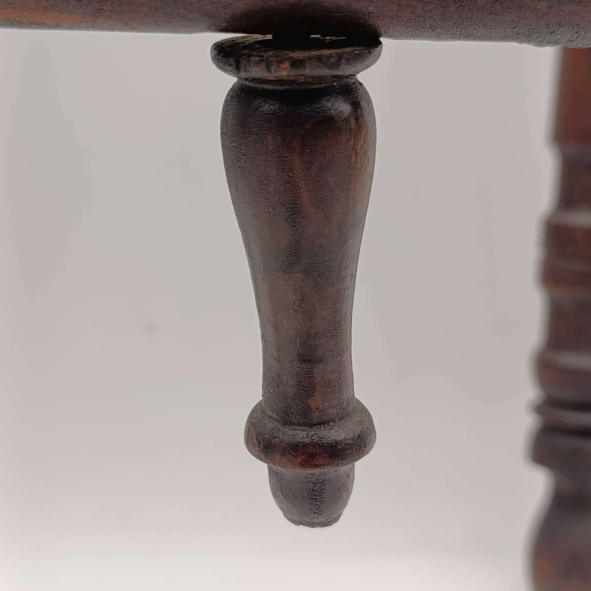 Antique folding table with tray and wooden foot piece