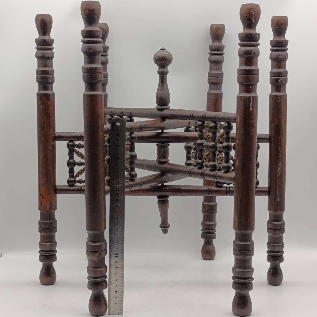 Antique folding table with tray and wooden foot piece