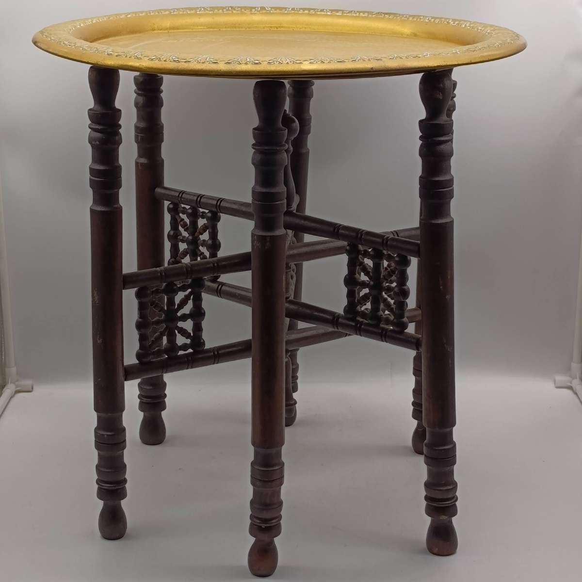 Antique folding table with tray and wooden foot piece