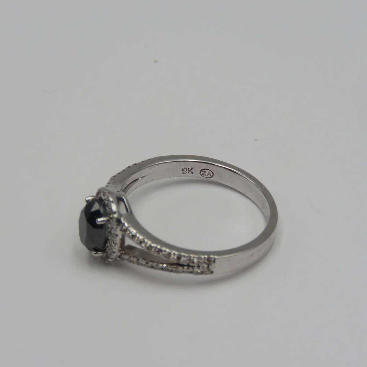 9kt White gold ring with black diamond of over 1ct plus 60 small diamonds - Size N
