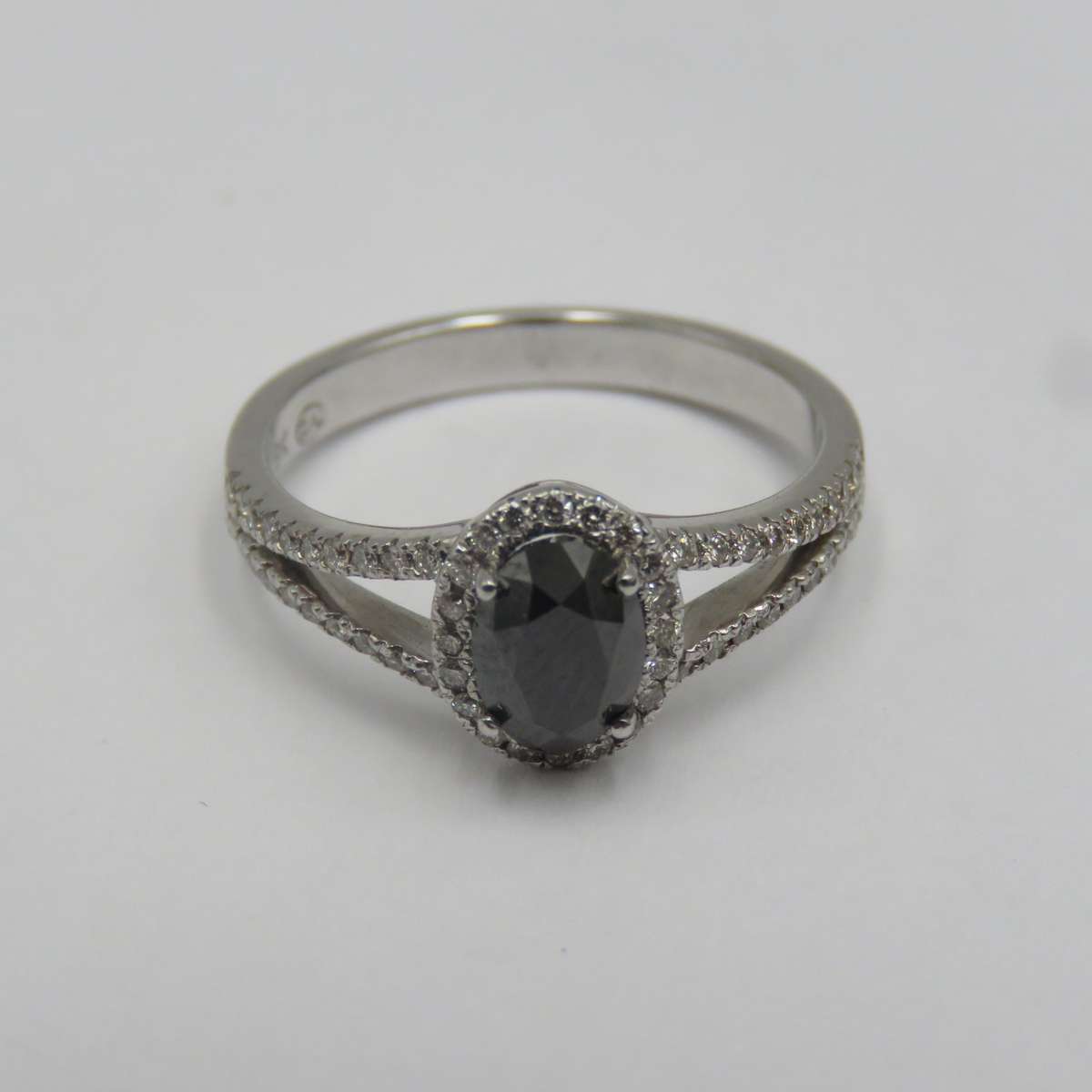 9kt White gold ring with black diamond of over 1ct plus 60 small diamonds - Size N