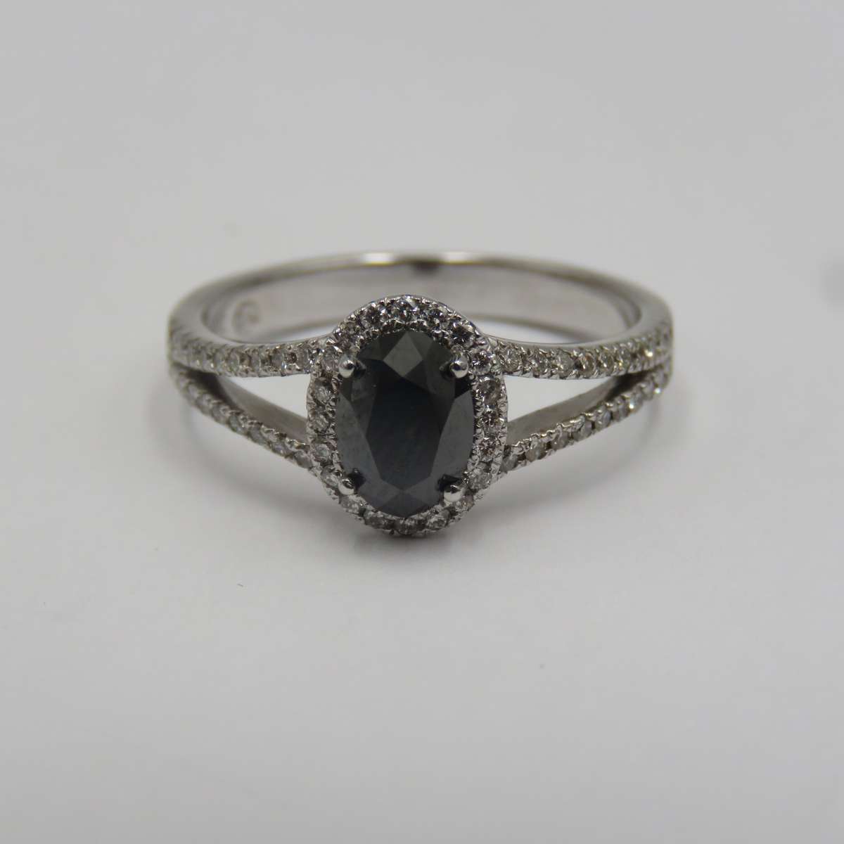 9kt White gold ring with black diamond of over 1ct plus 60 small diamonds - Size N