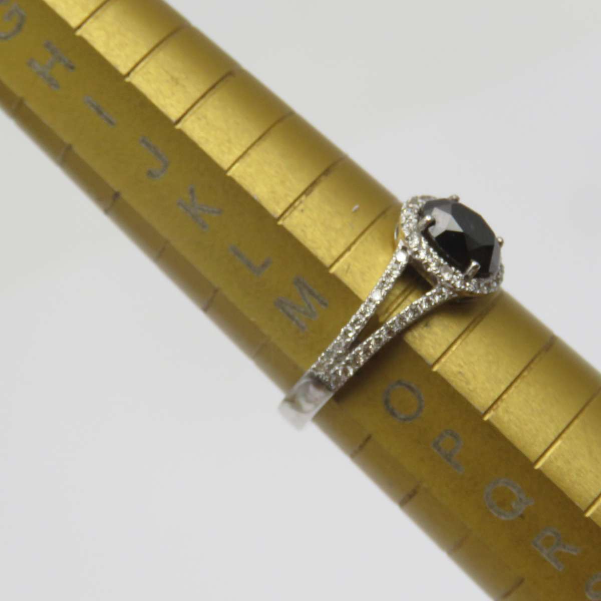 9kt White gold ring with black diamond of over 1ct plus 60 small diamonds - Size N