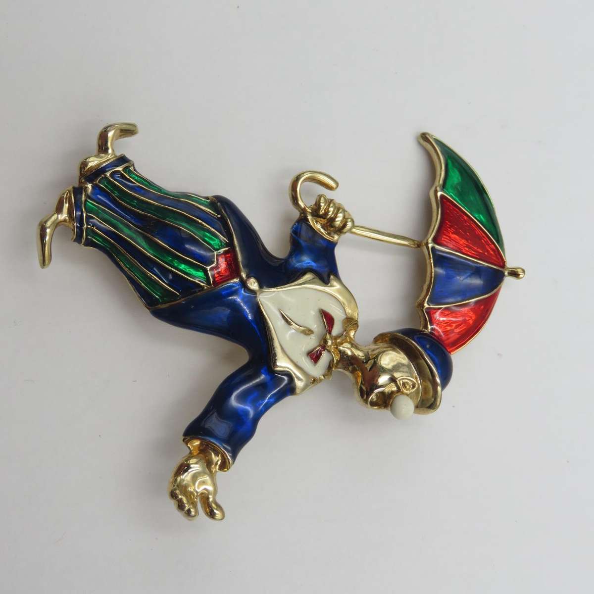 Vintage gold colour with enamel clown brooch
