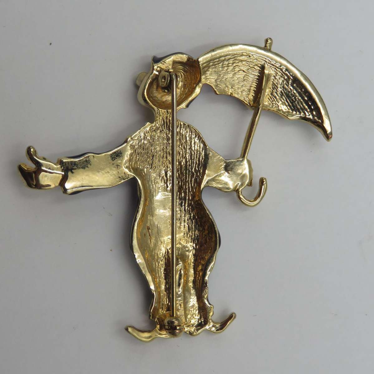 Vintage gold colour with enamel clown brooch
