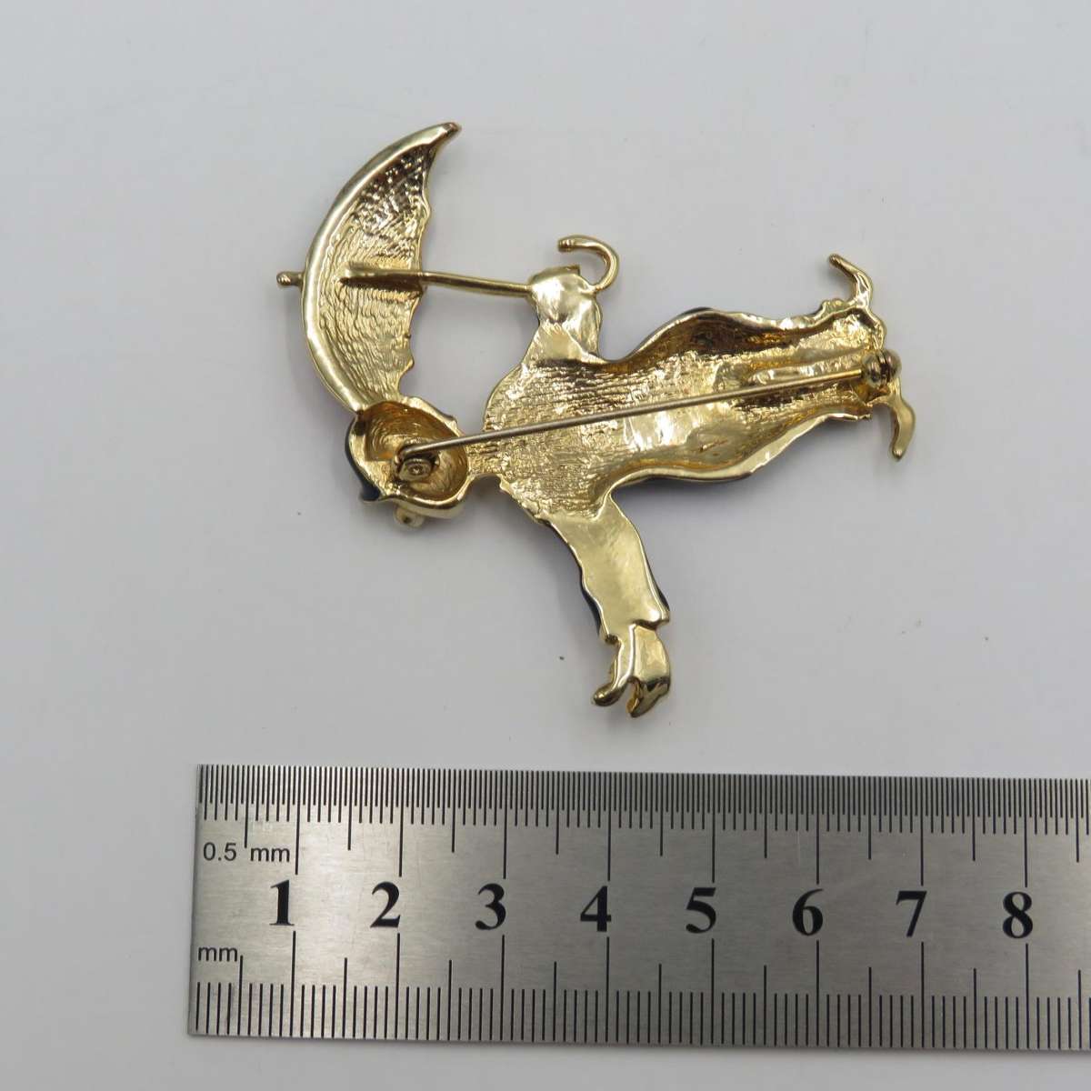 Vintage gold colour with enamel clown brooch