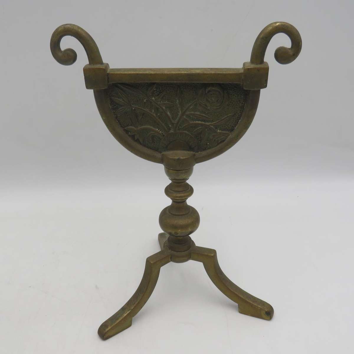 Antique brass stand for fire tools